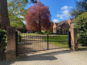 ELECTRIC GATES TO THE PRIVATE GARDENS AND RESIDENTS PARKING AREA- click for photo gallery